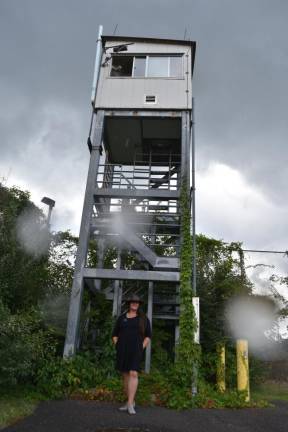 Sweetman in front of the old guard tower during a rain squall in July.