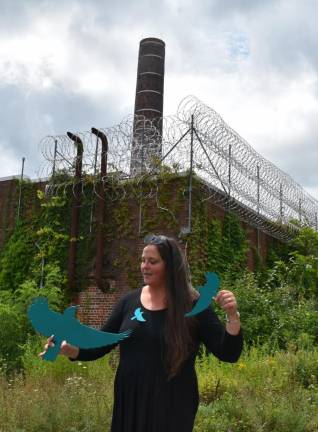 Sweetman with her bluebirds at the old prison site in July.