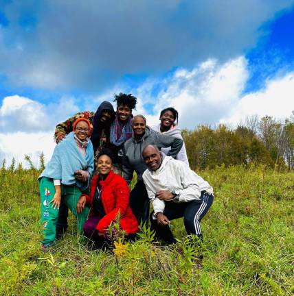 Omowale, Nadia (back) and friends at the farm