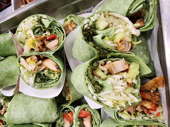 Spinach wraps served in the Sparta school district include shredded Jersey Girl cheese and local produce.