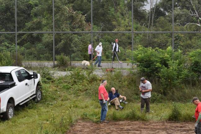 Passersby regularly holler in questions about what’s going on inside the fences.